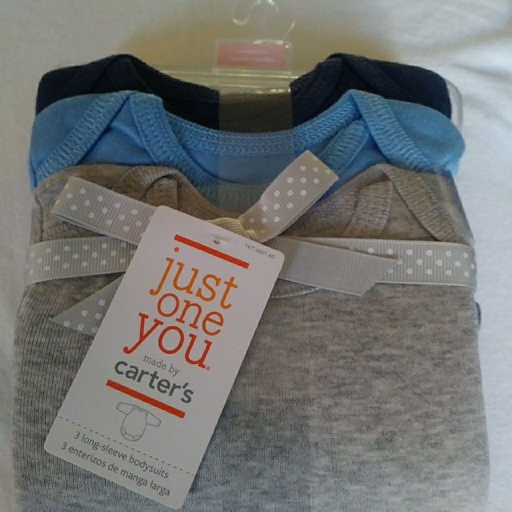 Carter's 3 long sleeve body suits. Newborn